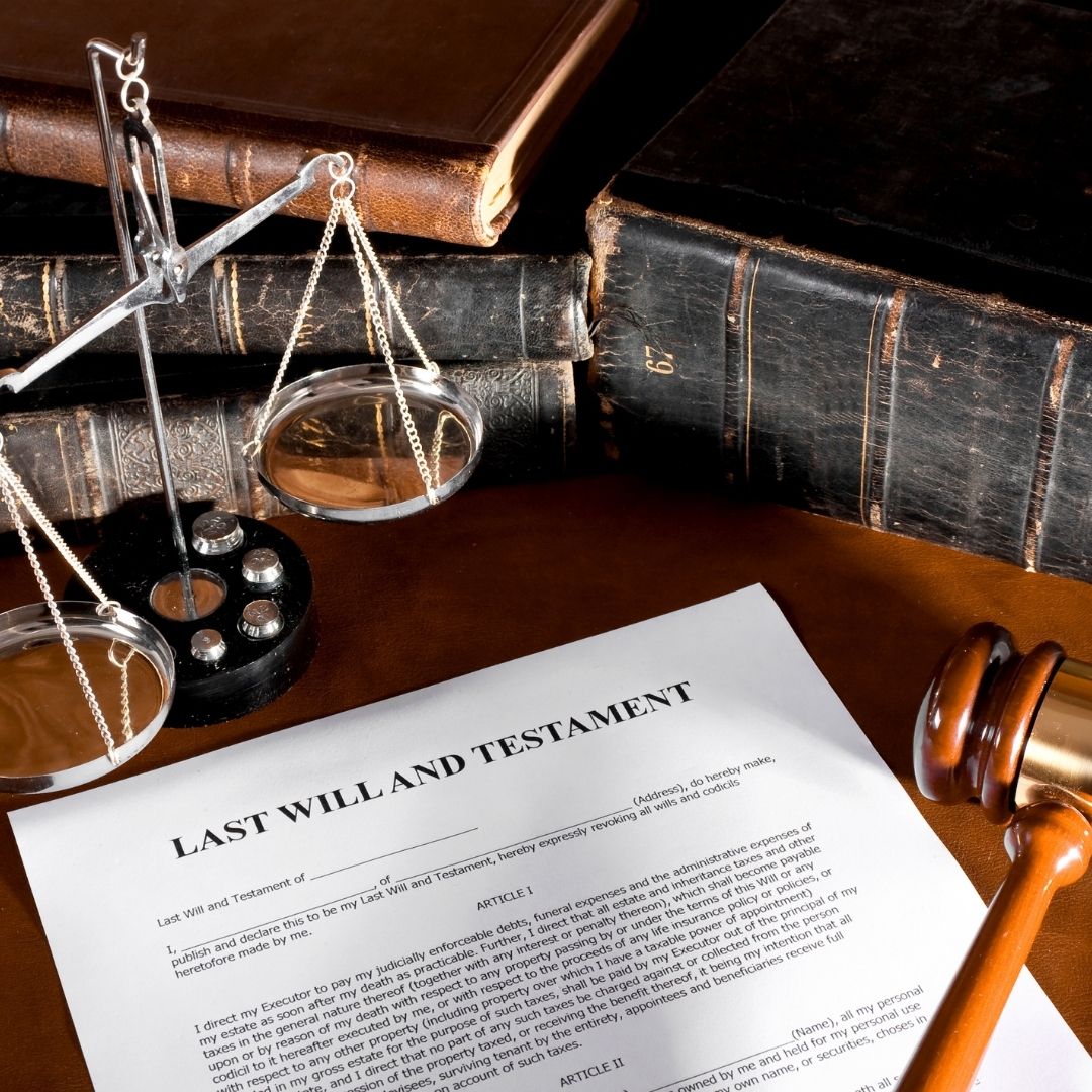 A will and trust document sitting on a lawyers desk